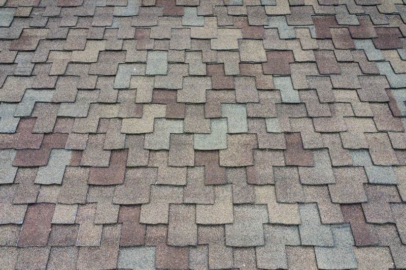 Close view of a multitone asphalt-shingle field